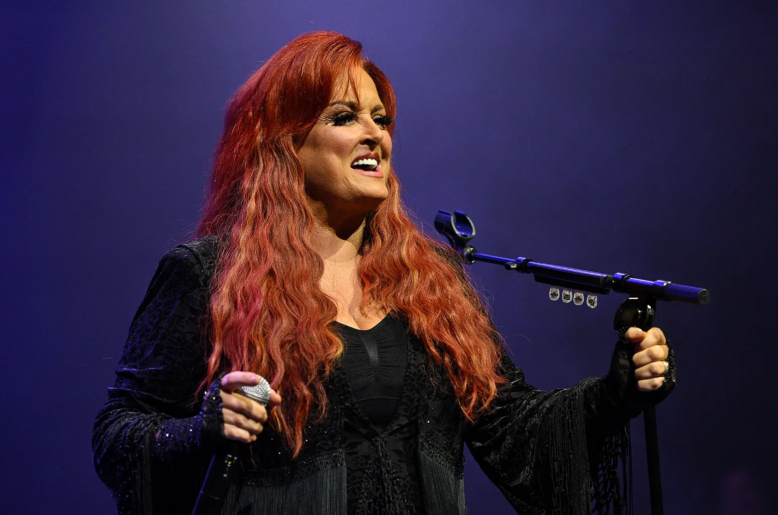 Wynonna performing live on stage
